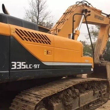 Tweedehands Hyundai 335LC-9 graafmachine 4m3 emmercapaciteit en originele hydraulische klep